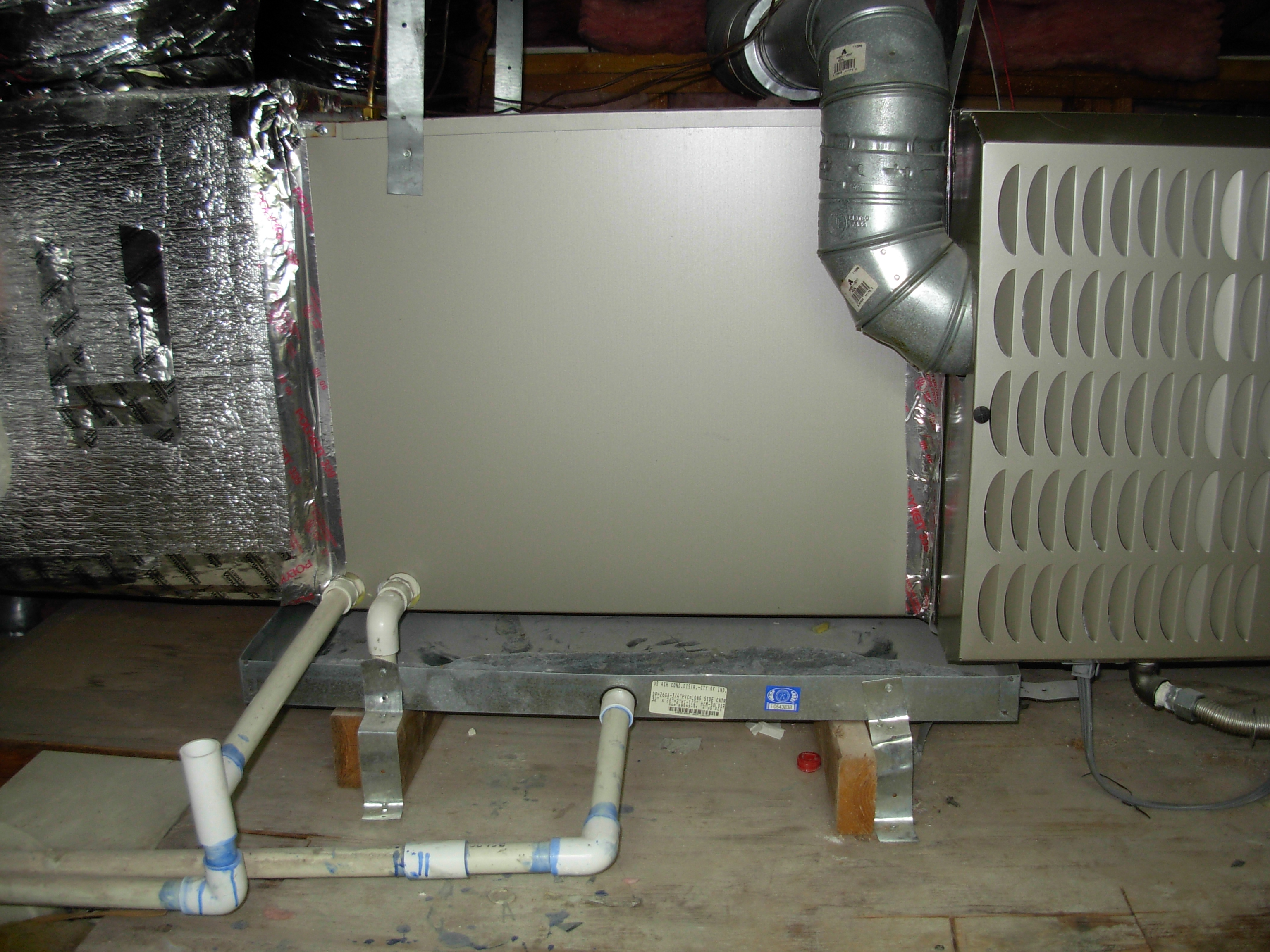 horizontal cooling coil with seconndary drain pan and drain line